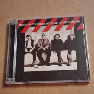 U2 "How to Dismantle an Atomic Bomb" CD/DVD – Black & Red Cover